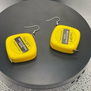 Cute tape measure earrings that really work silver tone